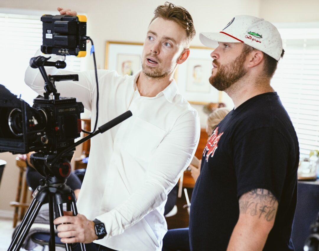 Director watching playback on monitor on a film set